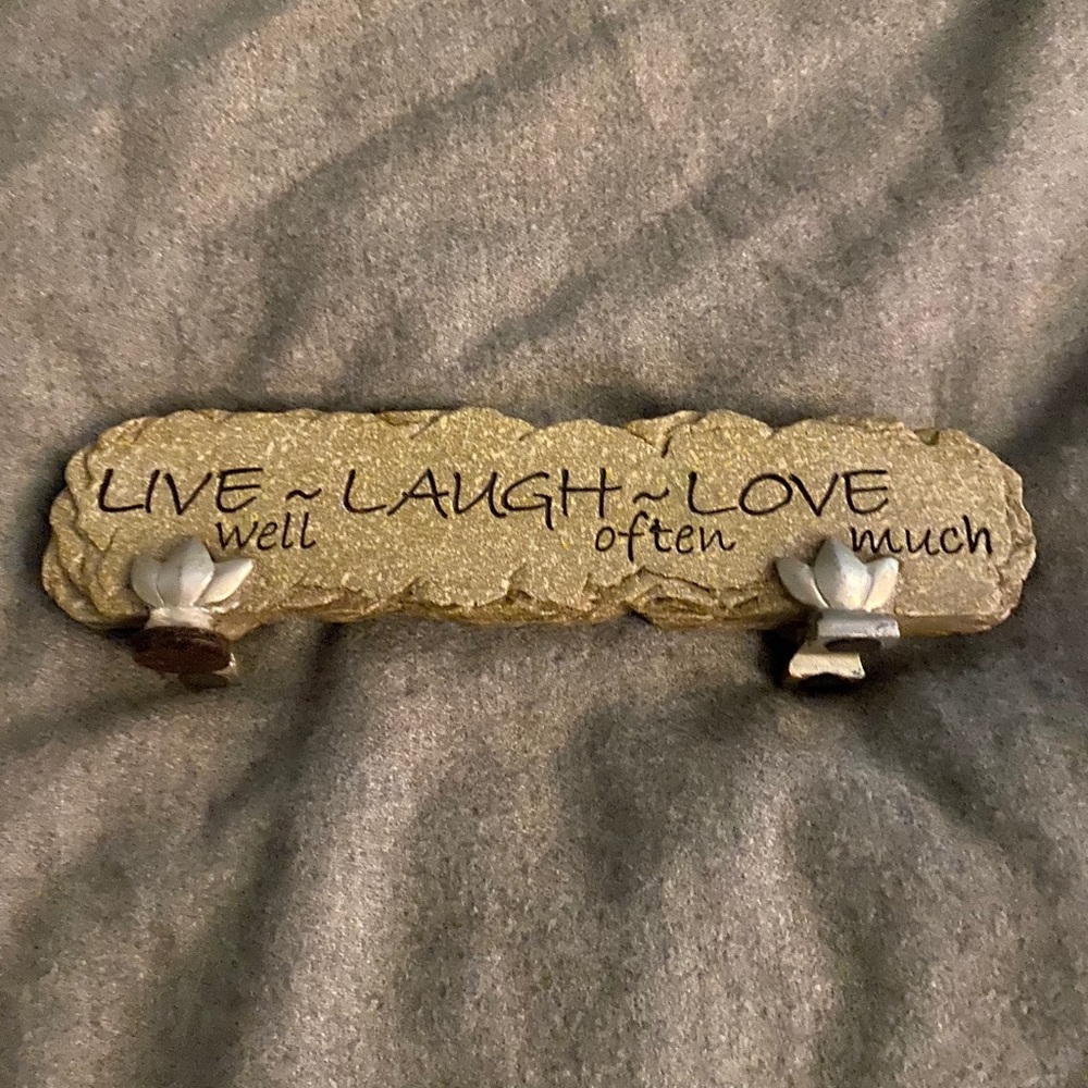 Live, love, laugh sign in faux stone material